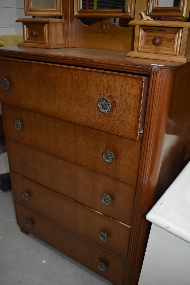 An early to mid 20th Century oak and ply bedroom chest of five drawers
