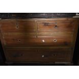 A Victorian stripped bedroom chest of two over two drawers