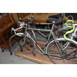 Two vintage road racing cycle bikes incluidng a Raleigh and Smalleys viscount
