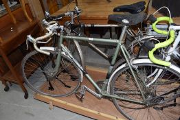 Two vintage road racing cycle bikes incluidng a Raleigh and Smalleys viscount