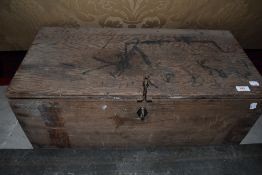 A vintage wood tool box and contents