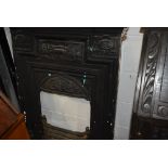 A traditional cast iron fireplace
