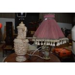 Two classical reproduction lamps one chalk ware and similar brass and onyx style