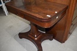 A 19th Century Rosewood fold over card table