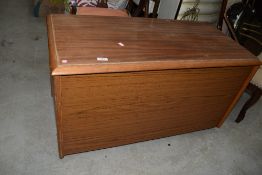 A teak style mid century bedding box