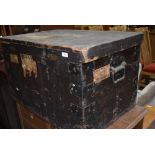 A vintage wooden travel trunk, including vintage shipping labels relating to Blue Star Line and Gold