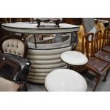A mid century chrome and vinyl mini cocktail dry bar set with two space age stools all in very