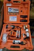 A Paslode site work nail gun with batteries etc