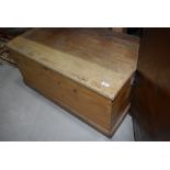 A stripped pine bedding box