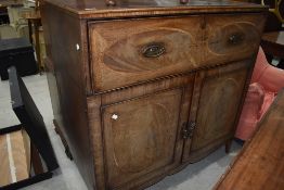 A 19th Century mahogany and inlaid secretaire having Regency style handles