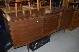 A vintage teak sideboard,could do with a tidy up