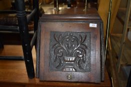 A 19th Century mahogany coal purdonium, with integral scuttle and coal