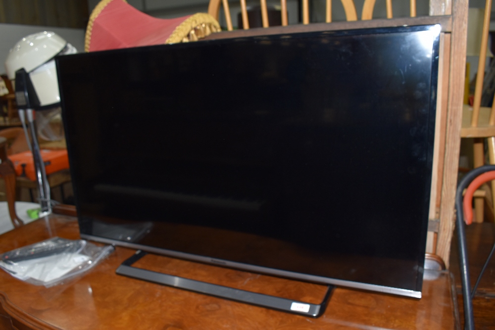 A Panasonic 40 inch television set with remote