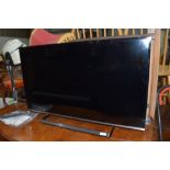 A Panasonic 40 inch television set with remote