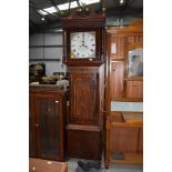 A 19th Century and later oak and mahogany long case clock having restored and painted dial, 8 day