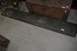 A slate mantel piece or lintel, width approx. 147cm