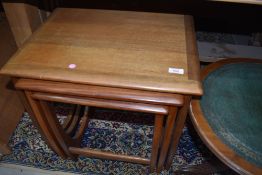 A vintage nest of three teak tables, possibly Victor Wilkins for G Plan