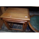 A vintage nest of three teak tables, possibly Victor Wilkins for G Plan
