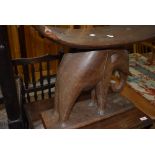 A traditional tribal art carved elephant stool