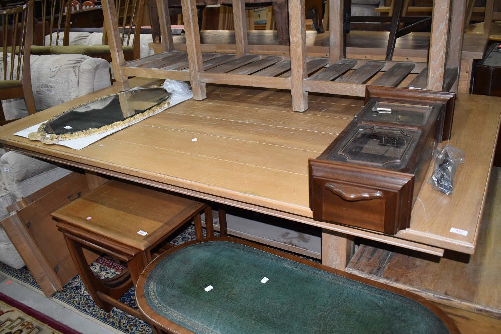 A large American oak extending dining table, possibly Ethan Allen, distressed finish