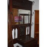 A late Victorian mahogany mirror back hall stand
