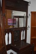 A late Victorian mahogany mirror back hall stand