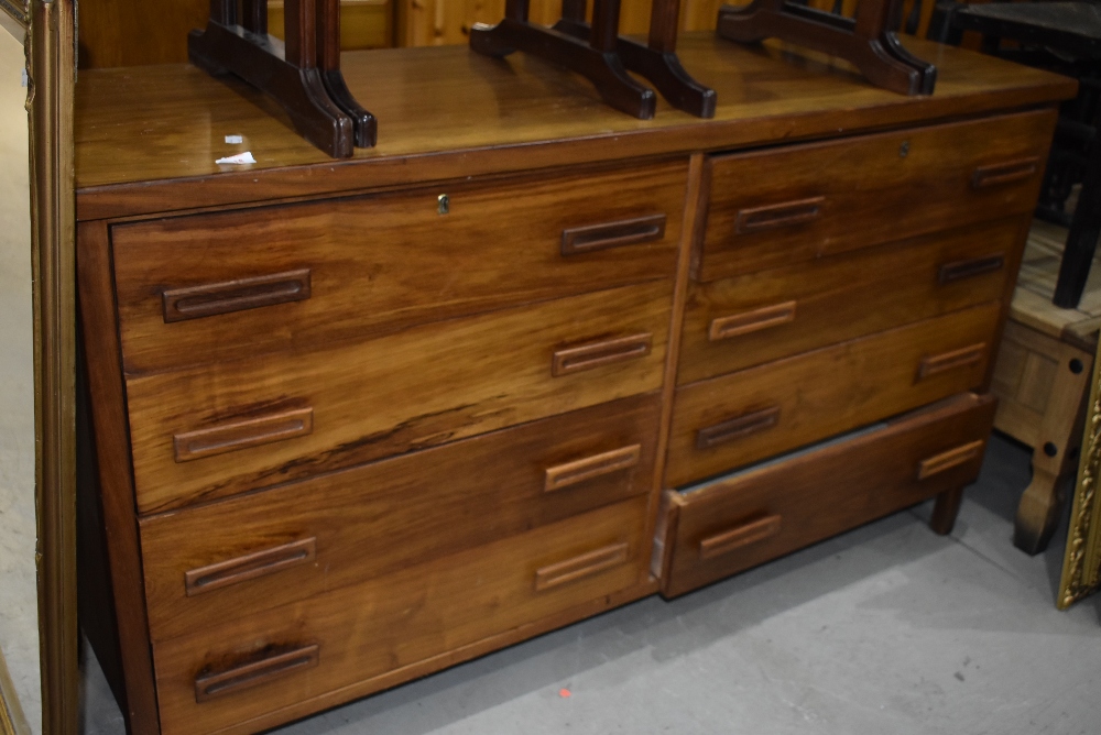 A teak sideboard/chest of eight drawer