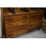 A teak sideboard/chest of eight drawer