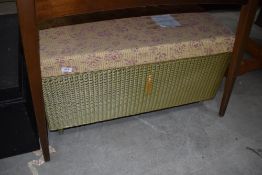 A Lloyd loom blanket box