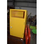 A vintage painted ply bedside cabinet, in yellow