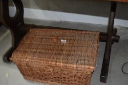 A traditional wicker picnic or similar hamper