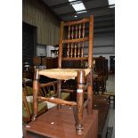 A traditional rush seated spindle back dining chair