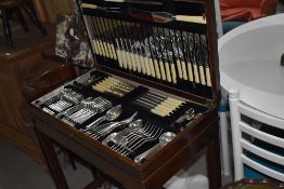 An early 20th Oak cased table canteen of viners cutlery, 12 cover , 128 piece