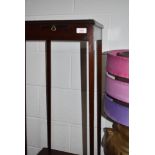 A 19th Century mahogany urn stand, with cup slide