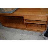 A vintage teak hifi sideboard having dividers for LP and singles, and cassette drawer