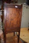 A 19th Century mahogany pot cupboard, with handled top