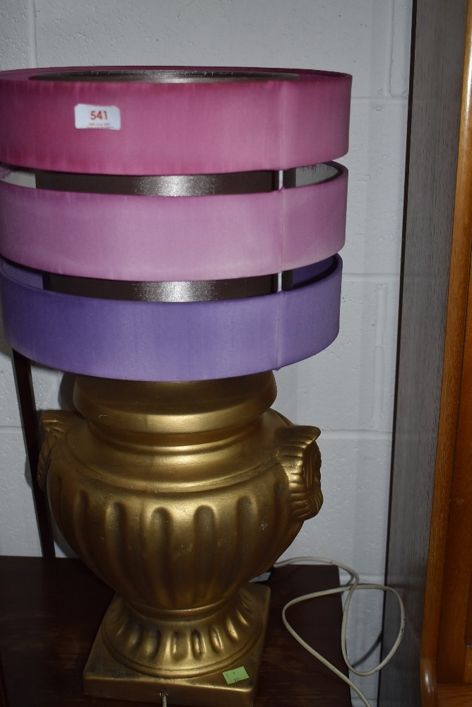 A ceramic bodied gold lamp and shade