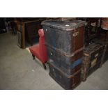 A vintage hard bodied travel trunk with wooden ribs