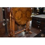 A 19th Century walnut Sutherland style occasional table, having turned frame, brass and pot casters