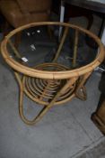 A bamboo framed low coffee table