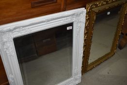 Two reproduction wall mirrors