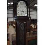 A Gothic styled grandfather or long case clock having carved and decorated case with painted face
