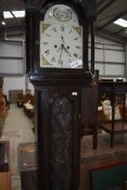 A Gothic styled grandfather or long case clock having carved and decorated case with painted face