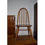 A light Ercol hoop and stick back kitchen chair