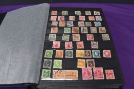 A large Stock Book containing New Zealand Stamps, early to modern, mint and used