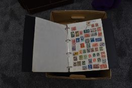 A box of Commonwealth Stamps, loose and in albums, mainly used