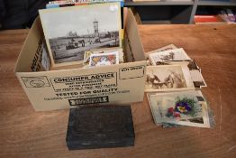 A collection of Ephemera including World & GB Postcards, an Autograph Album containing drawing and