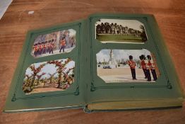 A vintage Postcard Album containing approx 200 cards, mainly GB, Real Photo's, Street Scenes,