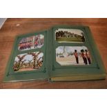 A vintage Postcard Album containing approx 200 cards, mainly GB, Real Photo's, Street Scenes,