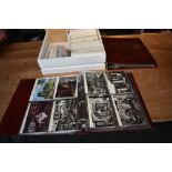 Two albums and a box of mainly modern Postcards including Royalty, Churches, Shipping etc